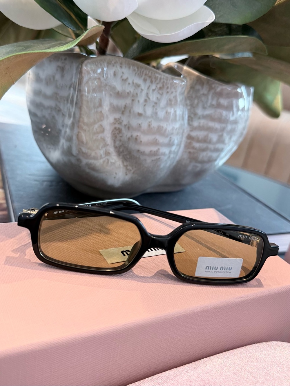 Miu Miu Black Frame Sunglasses with Brown Lenses